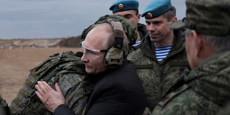 Russian President Vladimir Putin embraces a soldier as he visits a military training centre of the Western Military District for mobilised reservists in Ryazan Region, Russia, on October 20, 2022.