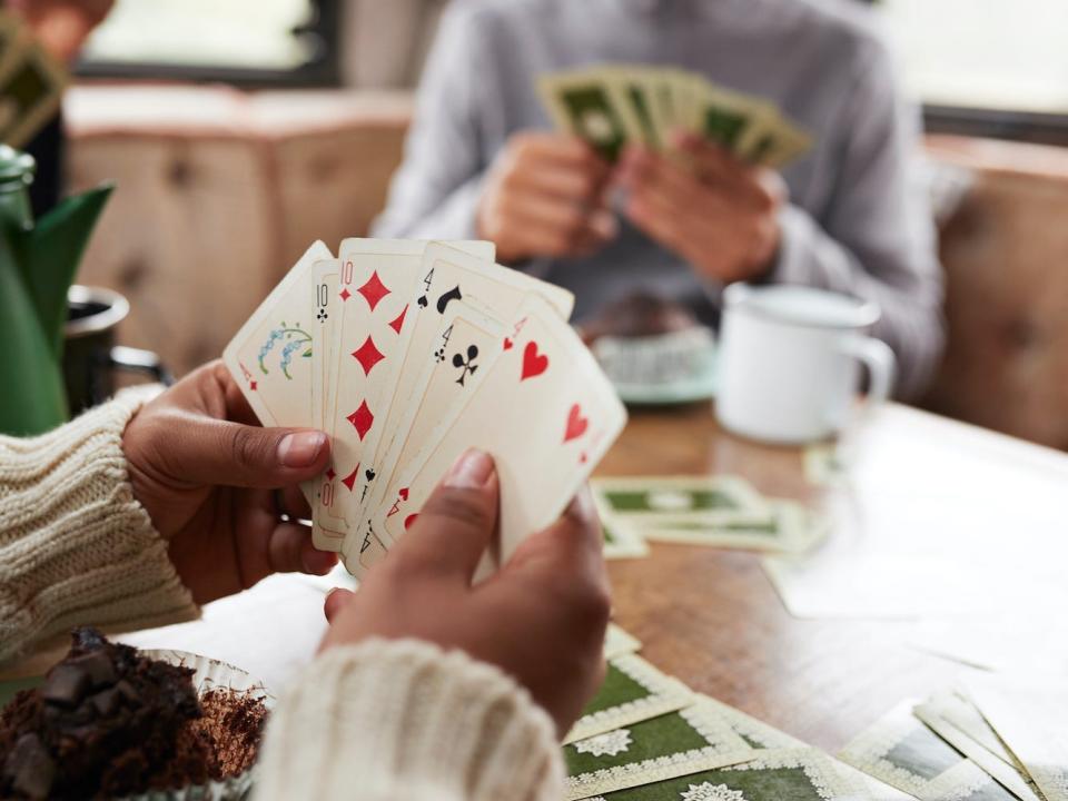 People play with a deck of cards.