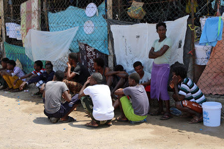 African migrants sit in a deportation center in Aden, Yemen March 17, 2018. Picture taken March 17, 2018. REUTERS/Fawaz Salman