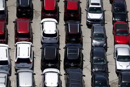 FILE PHOTO - Cars are seen in a parking lot in Palm Springs, California, U.S. on April 13, 2015. REUTERS/Lucy Nicholson/File Photo