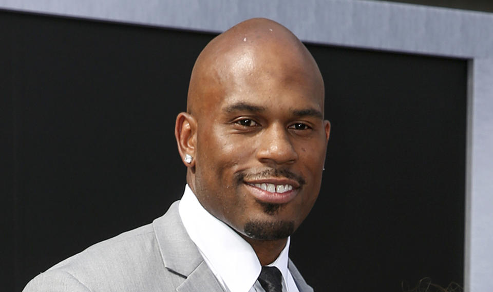 FILE - In this June 28, 2015, file photo, WWE wrestler Shad Gaspard arriving at the Los Angeles premiere of "Terminator Genisys" at the Dolby Theatre in Los Angeles. The former World Wrestling Entertainment pro remained missing Tuesday, May 19, 2020 after being swept out to sea while swimming with his young son over the weekend off Southern California, police said. Gaspard's 10-year-old son Aryeh was rescued and several other swimmers made it out of the water safely after they were caught in a rip current Sunday afternoon at Venice Beach in Los Angeles. (Photo by Rich Fury/Invision/AP, File)