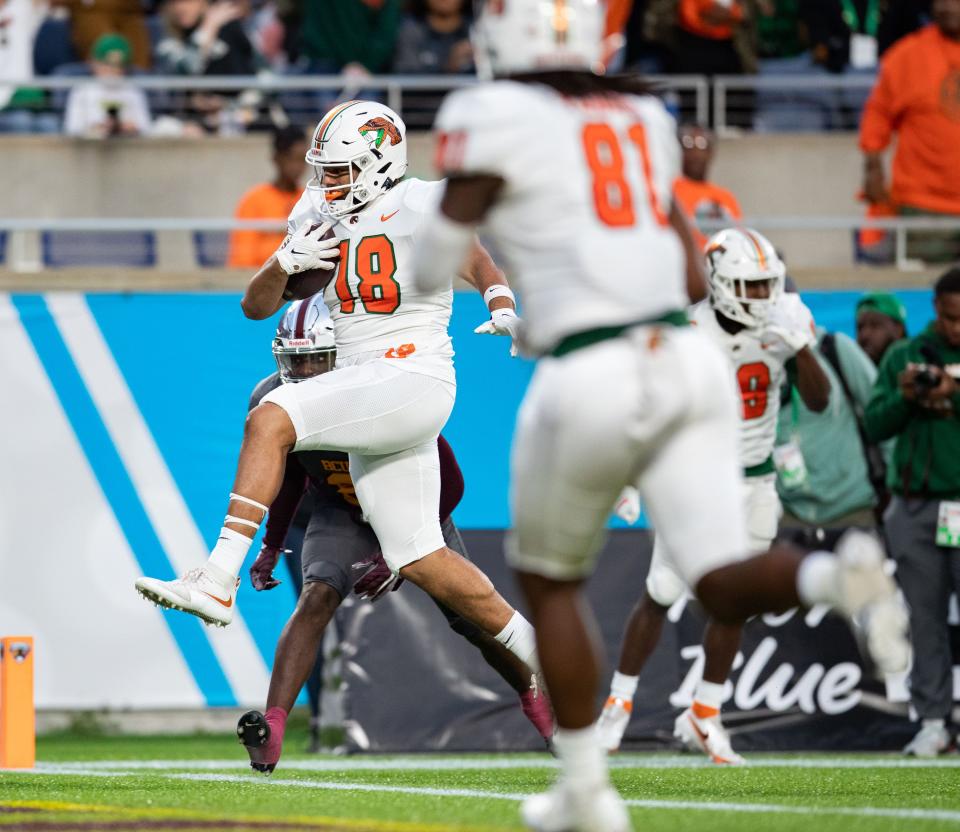 Florida A&M Rattlers tight end Koby Gross (18) runs into the end zone for a touchdown. The FAMU Rattlers defeated the BCU Wildcats 41-20 during the annual Florida Classic at Camping World Stadium on Saturday, Nov. 19, 2022.