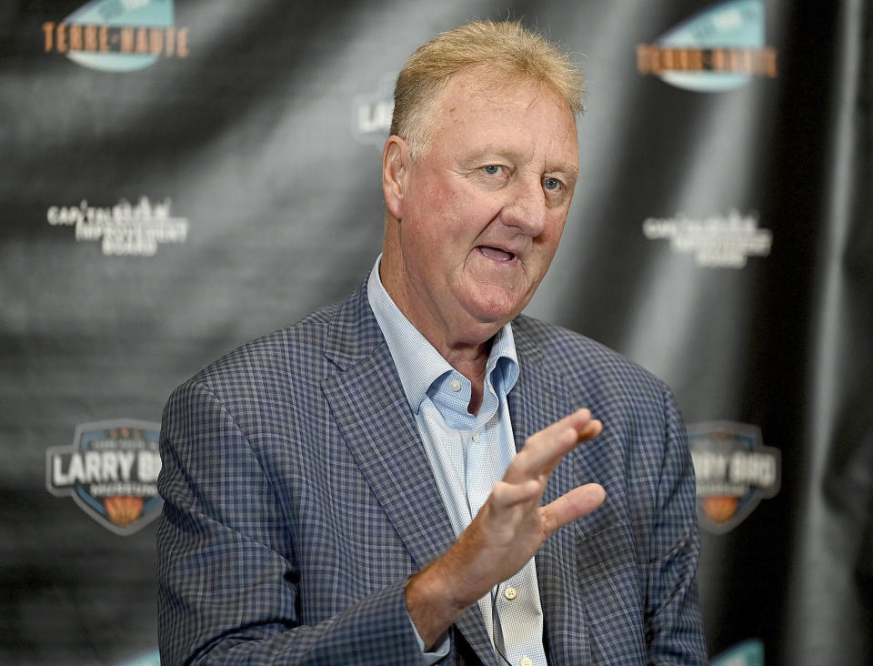 Indiana State University and Boston Celtics great Larry Bird explains how his former Springs Valley High School coach, Jim Jones, taught him to handle the ball during a press conference after the grand opening ceremony for the Larry Bird Museum, Thursday, May 30, 2024, in Terre Haute, Ind. (Joseph C. Garza/The Tribune-Star via AP)