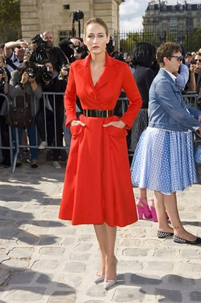 <p><b>Leelee Sobieski</b></p> <p>It's fitting that actress Leelee Sobieski, who only earlier this year wore a luminous white poplin dress from Raf Simon's penultimate collection for Jil Sander, would don a vibrant poppy red coatdress from his debut Christian Dior Couture collection-it made for an exquisite and resounding 'welcome back'-and to attend his first spring/summer 2012 ready-to-wear show for the house, no less.</p>