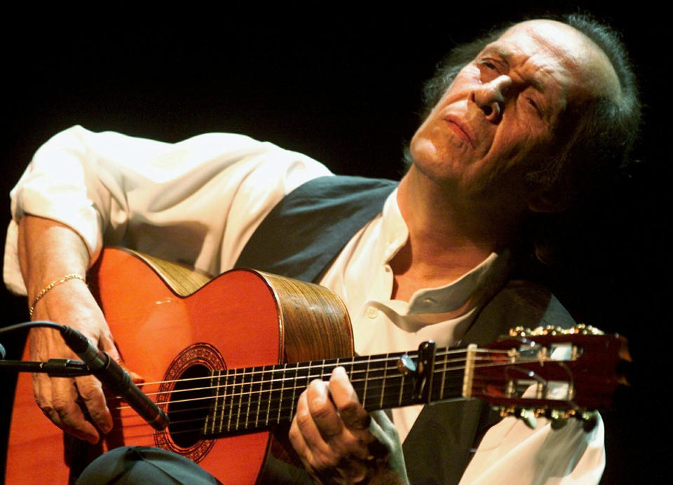 FILE - In this July 12, 2001 file photo, Spanish guitarist Paco de Lucia performs during the 35th Montreux Jazz Festival in Montreux, Switzerland. Jose Ignacio Landaluce, mayor of de Lucia's native Spanish town of Algeciras said in a statement Wednesday Feb. 26, 2014 the world-renowned flamenco guitarist Paco de Lucia has died in Mexico, where he lived. He was 66. The cause of death was not immediately made known. (AP Photo/Keystone, Laurent Gillieron, File)