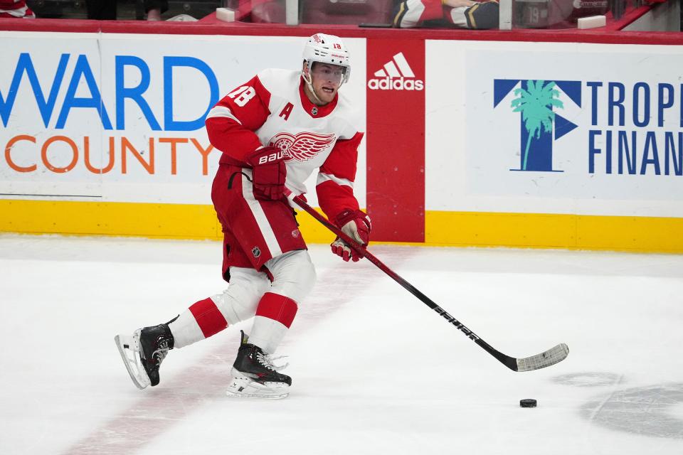 Red Wings center Andrew Copp skates with the puck against the Panthers during the third period of the Wings' 3-2 overtime win on Wednesday, Jan. 17, 2024, in Sunrise, Florida.