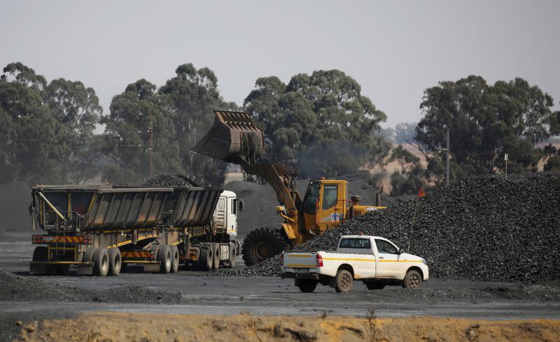 FILE PHOTO: Coal is loaded onto a truck at the Woestalleen colliery near Middleburg in Mpumalanga province,