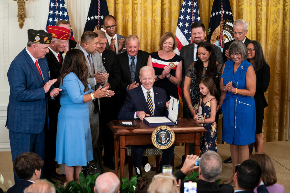 President Joe Biden signs the PACT Act into law at the White House in Washington, D.C., Aug. 10, 2022.<span class="copyright">Sarah Silbiger—The Washington Post/Getty Images</span>