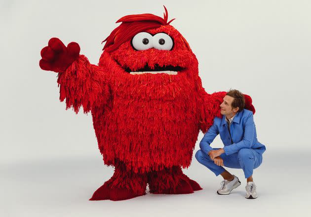 Ben Rector (left, with his Muppet monster co-star Joy) released 