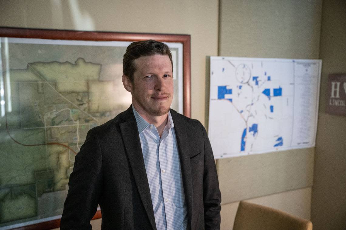 Lincoln City Manager Sean Scully stands at his office in July. The city’s population has grown from about 11,000 in 2000 to more than 52,000 today.