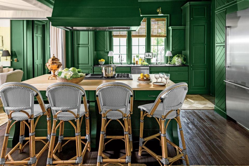 <p>Architect Bill Ingram drew inspiration from a gorgeously retro green kitchen featured in the June 1975 issue of Southern Living. He coated the <a href="https://www.southernliving.com/home/idea-houses/2016-idea-house-photo-tour" rel="nofollow noopener" target="_blank" data-ylk="slk:2016 Southern Living Idea House;elm:context_link;itc:0;sec:content-canvas" class="link ">2016 Southern Living Idea House</a> in Sherwin-Williams <a href="https://www.sherwin-williams.com/homeowners/color/find-and-explore-colors/paint-colors-by-family/SW6447-evergreens" rel="nofollow noopener" target="_blank" data-ylk="slk:Evergreens (SW 6447);elm:context_link;itc:0;sec:content-canvas" class="link ">Evergreens (SW 6447)</a> for a perfectly modern take on colorful kitchen design. </p>