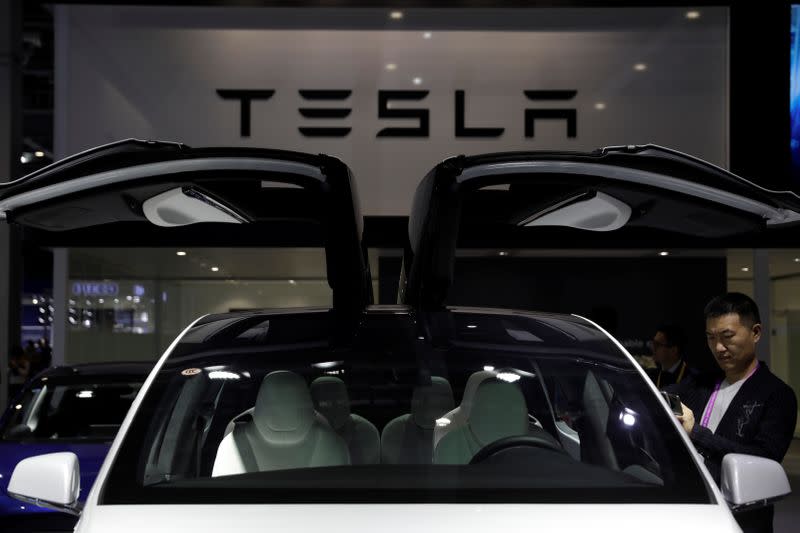 A Tesla sign is seen at the second China International Import Expo (CIIE) in Shanghai
