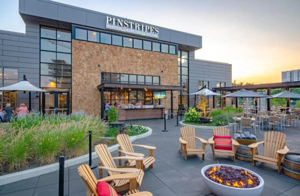 The exterior of Pinstripes, an Italian bistro with bowling lanes and bocce courts, in Bethesda, Md.