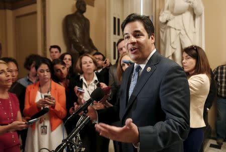 U.S. Representative Raul Labrador (R-ID) talks to the media about Representative Paul Ryan after the House Freedom Caucus meeting on Capitol Hill in Washington October 21, 2015. REUTERS/Yuri Gripas