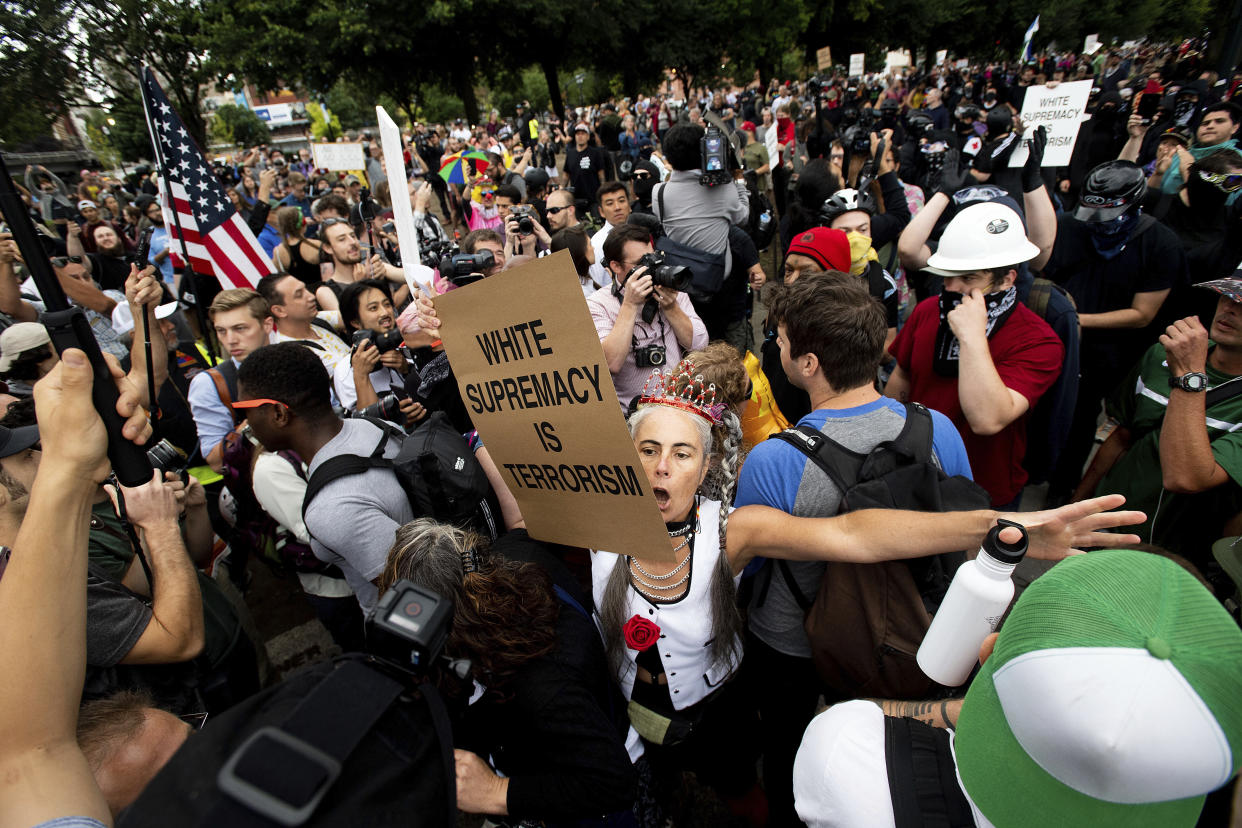 Proud Boys and counterprotesters face off earlier this month in Portland, Oregon. (Photo: ASSOCIATED PRESS/Noah Berger)