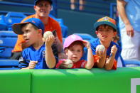 <p>Young fans seek autographs before a baseball game between the Miami Marlins and New York Mets at First Data Field in Port St. Lucie, Fla., Feb. 25, 2018. (Photo: Gordon Donovan/Yahoo News) </p>