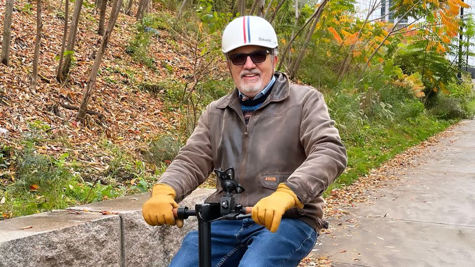 Peter Valdes-Dapena trying Honda's new electric scooter, the Honda Motocompacto. - Peter Valdes-Dapena/CNN