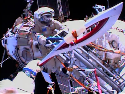 Two Russian cosmonauts conducted a ceremonial handoff of the Olympic torch at the start of a planned six-hour spacewalk to perform maintenance on the International Space Station. For obvious safety reasons, the flame was not lit. (Nov. 9)