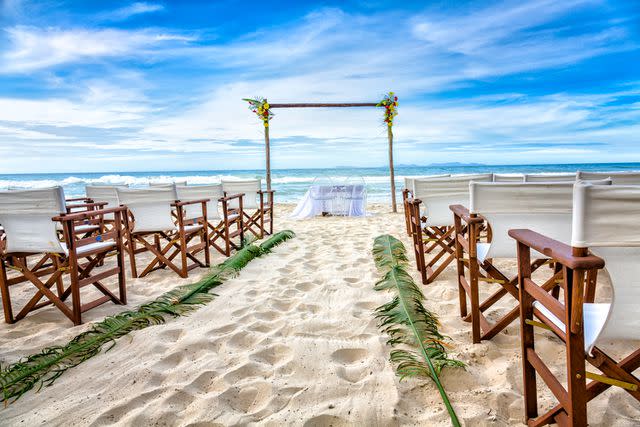 <p>Getty</p> A beach wedding (stock image)