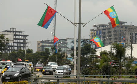 FILE PHOTO: Ethiopia's and Eritrea's flags are displayed on the street ahead of Eritrea's President Isaias Afwerki's visit to Addis Ababa, Ethiopia July 13, 2018. REUTERS/Tiksa Negeri/File Photo