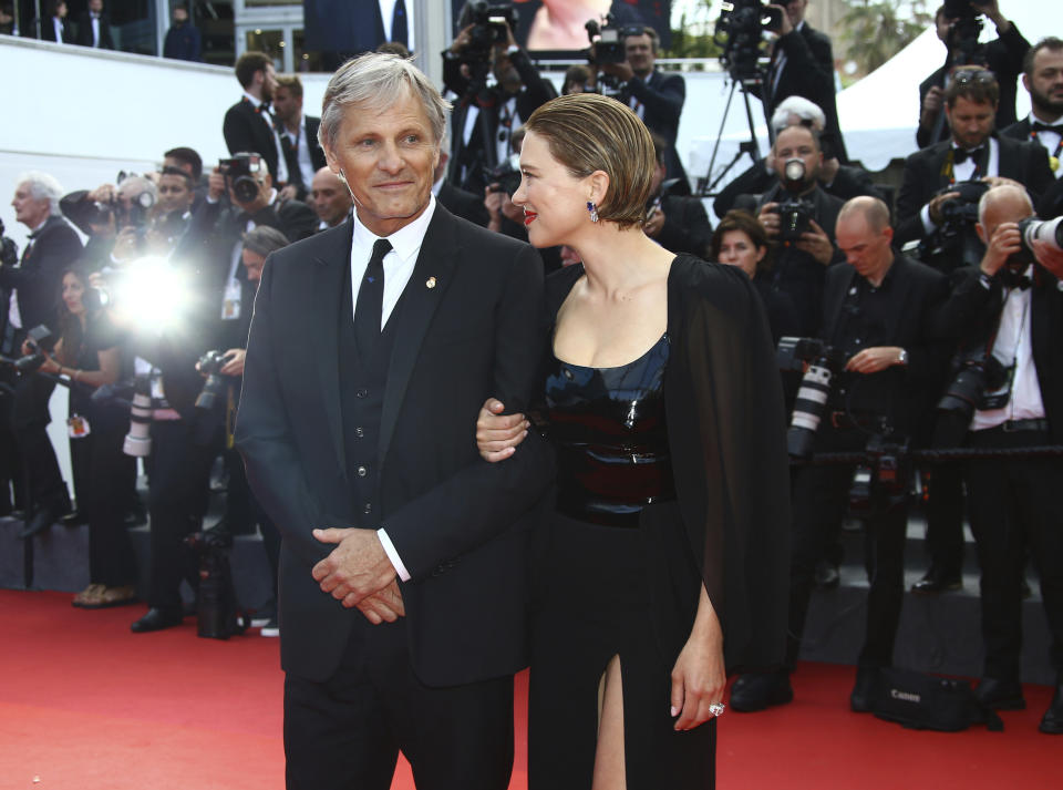 Viggo Mortensen, left, and Lea Seydoux pose for photographers upon arrival at the 75th anniversary celebration of the Cannes film festival and the premiere of the film 'The Innocent' at the 75th international film festival, Cannes, southern France, Tuesday, May 24, 2022. (Photo by Joel C Ryan/Invision/AP)