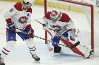 Montreal Canadiens goaltender Sam Montembeault (35) saves a shot during the third period of an NHL hockey game against the Buffalo Sabres on Friday, Nov. 26, 2021, in Buffalo, N.Y. (AP Photo/Joshua Bessex)