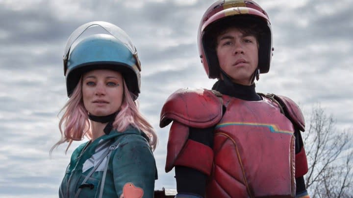 Laurence Leboeuf and Munro Chambers in Turbo Kid.