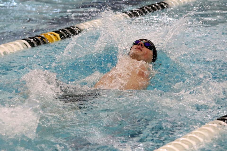 Corning's Caden Faulk won the 100-yard backstroke at the Section 4 Class A boys swimming and diving championships Feb. 18, 2023 at Watkins Glen High School.