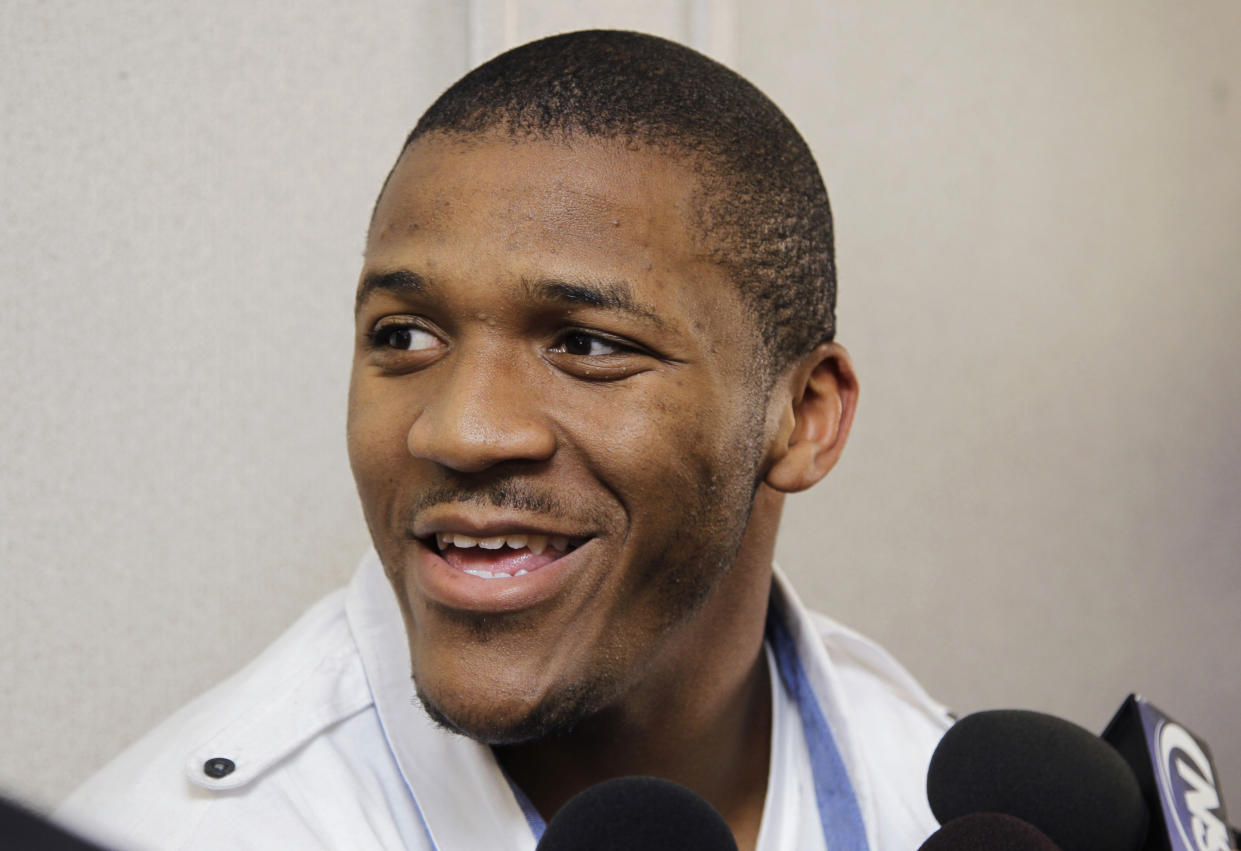 FILE - San Francisco 49ers second-round draft pick LaMichael James, a running back from Oregon, smiles during a news conference at the NFL football team's training facility in Santa Clara, Calif., Thursday, May 10, 2012. LaMichael James was elected to the College Football Hall of Fame on Monday, Jan. 9, 2023. (AP Photo/Paul Sakuma, File)