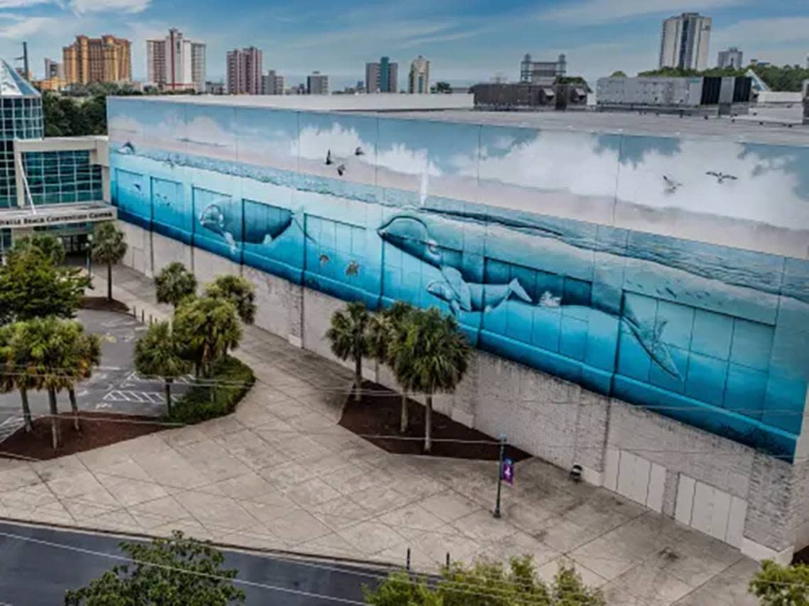 Robert Wyland’s “Whaling Wall” painted on the side of the Myrtle Beach Convention Center and refreshed by Tommy Simpson in 2018. Courtesy VisitMyrtleBeach.com