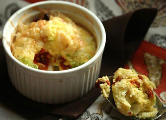 In this recipe, fresh and flavorful bay scallops are baked under a light and fluffy souffle-like topping. Digging in is just like eating a pot pie.    <strong>Get the Recipe for <a href="http://www.huffingtonpost.com/2011/10/27/scallop-puff_n_1059231.html" target="_hplink">Scallop Puff</a></strong>