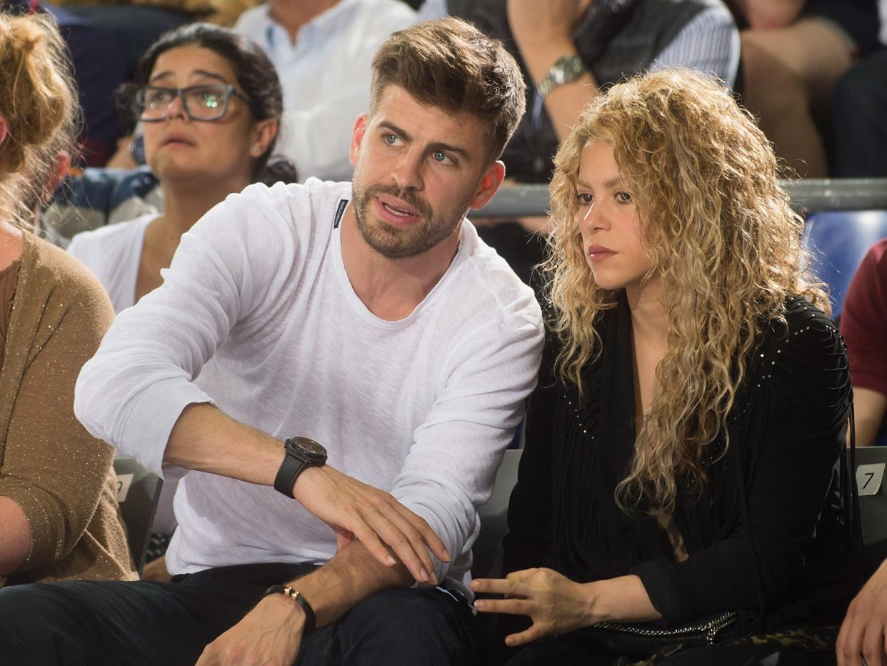 Gerard Pique, FC Barcelona football player and his partner colombian singer Shakira, attend the 2014-2015 Turkish Airlines Euroleague Basketball Play Off Game 2 between FC Barcelona v Olympiacos Piraeus at Palau Blaugrana on April 17, 2015 in Barcelona, Spain.