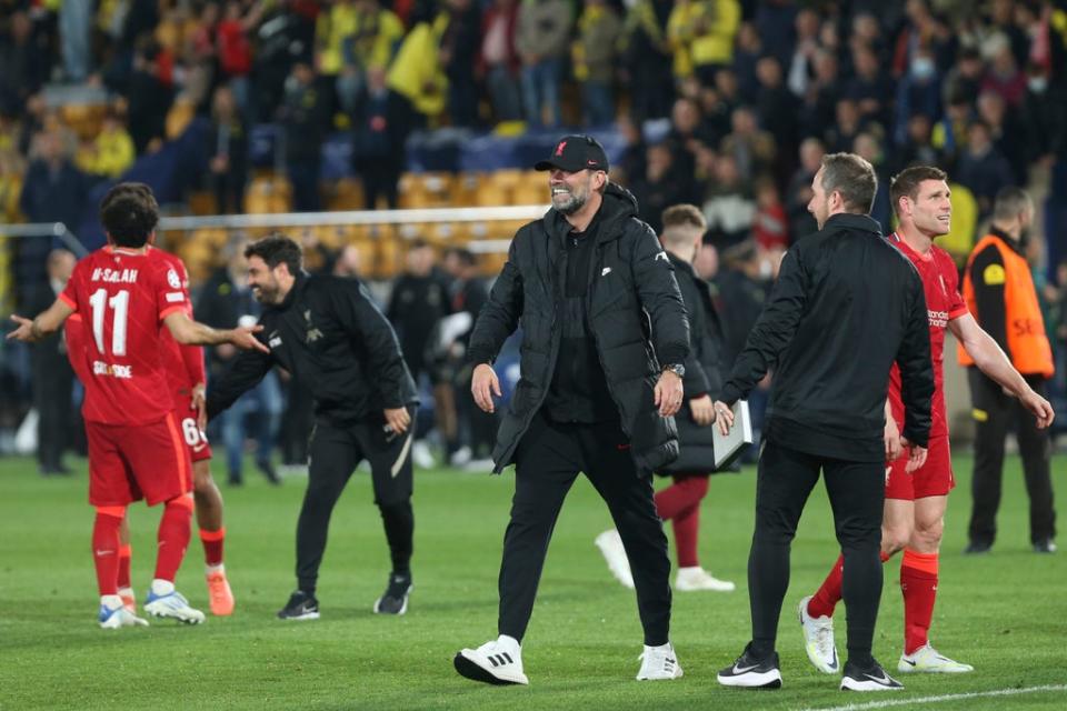 Jurgen Klopp, centre, celebrates Liverpool’s win (Alberto Saiz/AP) (AP)