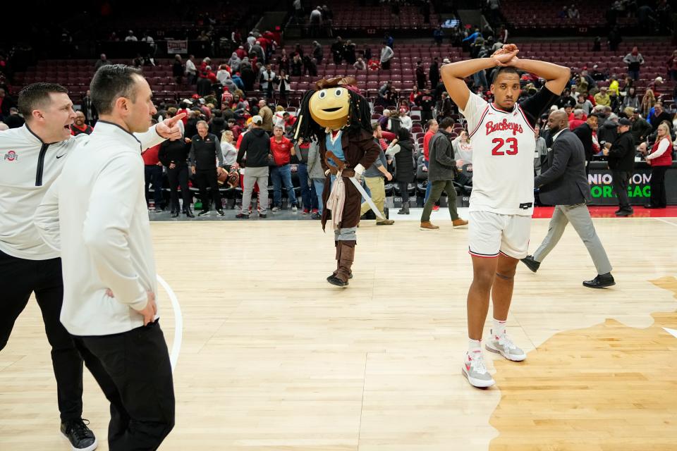 Ohio State center Zed Key stands at midcourt following Thursday's loss to Wisconsin.