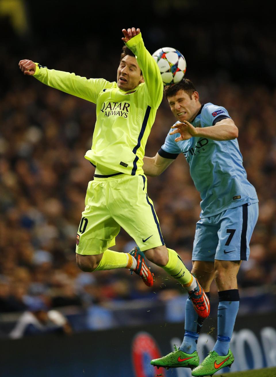 Football - Manchester City v FC Barcelona - UEFA Champions League Second Round First Leg - Etihad Stadium, Manchester, England - 24/2/15 Barcelona's Lionel Messi in action with Manchester City's James Milner Reuters / Darren Staples Livepic EDITORIAL USE ONLY.