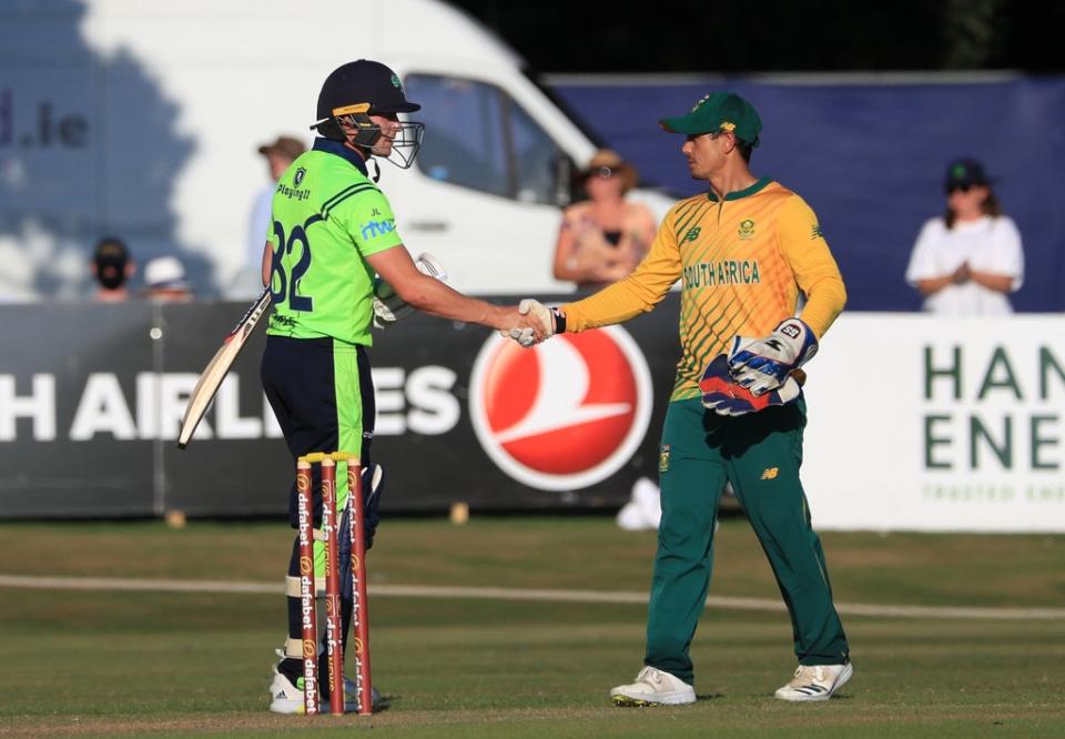 Ireland’s Joshua Little and South Africa’s Quinton de Kock (Donall Farmer/PA) (PA Wire)