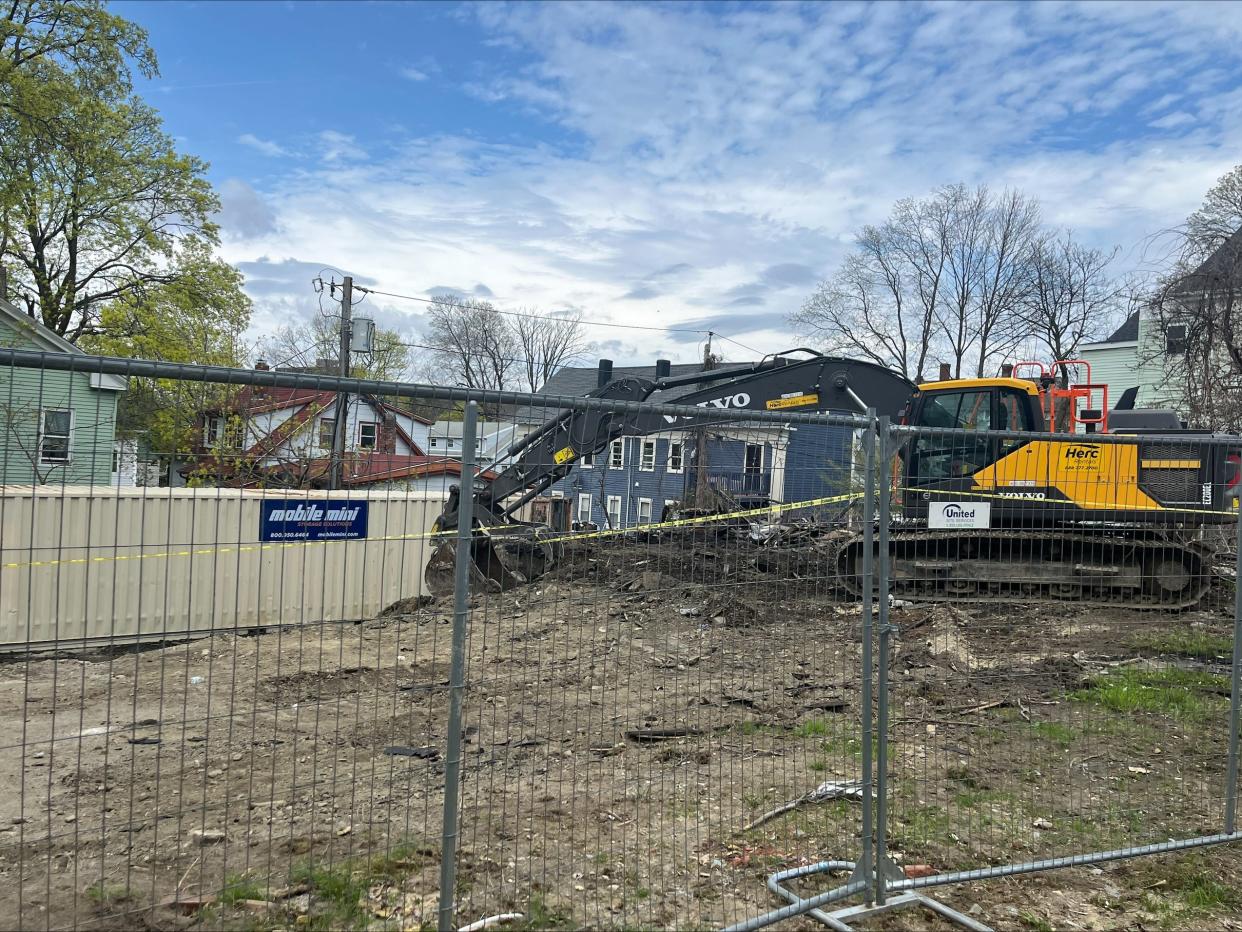 The burned-out carriage house was leveled and carted away on Monday.