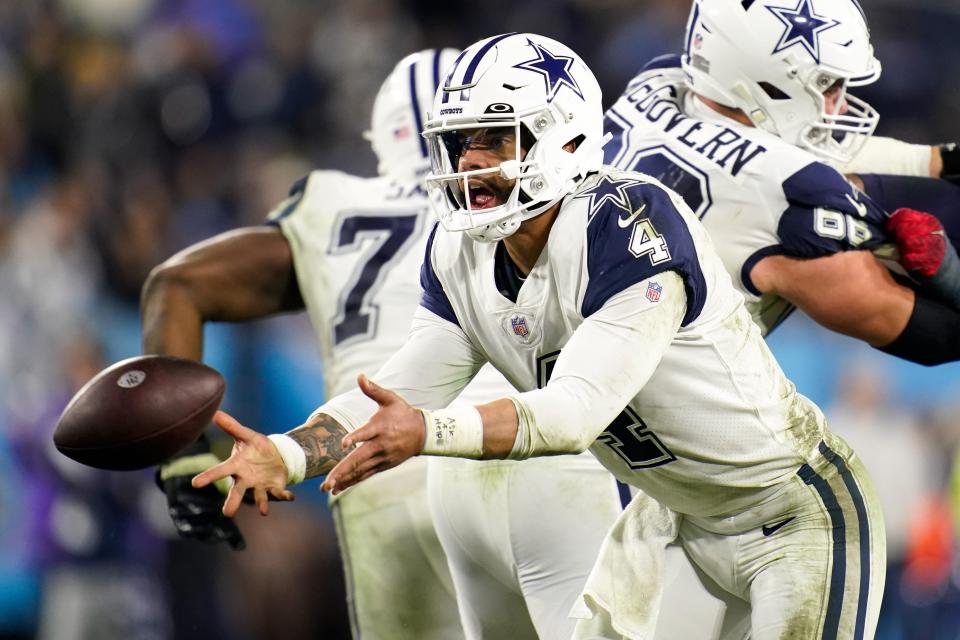 Dak Prescott tosses the ball in the fourth quarter  Thursday night against the Titans.