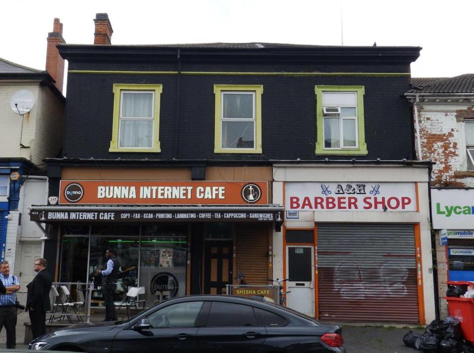 Police searched a flat above an internet cafe and barbers' shop in Sparkbrook, Birmingham (Lizzie Dearden)