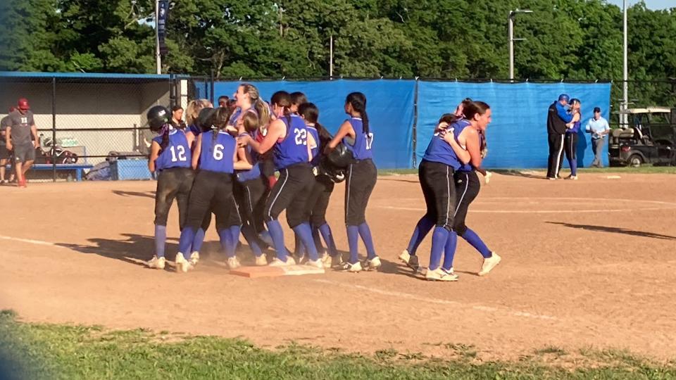 Pearl River celebrates at first as the second-seeded Pirates defeat sixth-seeded Nyack 3-2 in eight innings in Wednesday's Section 1 Class A softball semifinals.