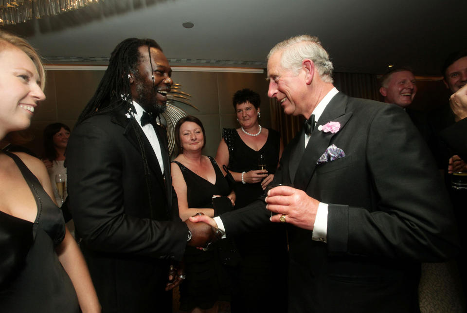 The Prince of Wales, President of The Prince's Trust and the British Asian Trust, meeting Levi Roots during a dinner in aid of both charities hosted by members of the British Asian Community, at the Dorchester Hotel in London.