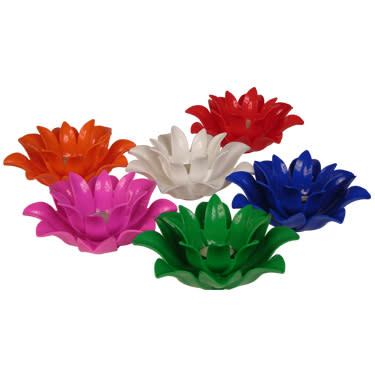 Bright, flower-shaped candles would be amazing floating en masse in a swimming pool.