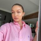 <p>Pregnant Gigi Hadid glowed after her Instagram Live make-up tutorial with Erin Parsons where she <a href="https://www.elle.com/uk/life-and-culture/a32624290/gigi-hadid-pregnancy-face-fillers/" rel="nofollow noopener" target="_blank" data-ylk="slk:denied ever having injectables;elm:context_link;itc:0;sec:content-canvas" class="link ">denied ever having injectables</a>: 'People think I do fillers on my face, and that's why my face is round—I've had this since I was born.'</p><p>The 25-year-old posted a selection of selfies wearing an <a href="https://www.asos.com/polo-ralph-lauren/polo-ralph-lauren-player-logo-garment-dye-oxford-button-down-shirt-slim-fit-in-pink/prd/11643597?affid=25452&_Cj0KCQjwzZj2BRDVARIsABs3l9LDwNEMg1rz1GW4hzjBJ6sEA2iCzxFb3OAhuBE8_oCAN0iFdQAy-gsaAt5pEALw_wcB&channelref=product+search&ppcadref=9933071238%7c103204517009%7caud-660057333357:pla-294682000766&gclid=Cj0KCQjwzZj2BRDVARIsABs3l9LDwNEMg1rz1GW4hzjBJ6sEA2iCzxFb3OAhuBE8_oCAN0iFdQAy-gsaAt5pEALw_wcB&gclsrc=aw.ds" rel="nofollow noopener" target="_blank" data-ylk="slk:oversized, pink, Ralph Lauren shirt;elm:context_link;itc:0;sec:content-canvas" class="link "> oversized, pink, Ralph Lauren shirt</a>. The mum-to-be's colour choice had a fan speculating in the comments as to whether Hadid was hinting to her and Zayn Malik's unborn baby's sex. Pink for a girl? Watch this space.</p><p><a href="https://www.instagram.com/p/CAbQ1fxnMJO/" rel="nofollow noopener" target="_blank" data-ylk="slk:See the original post on Instagram;elm:context_link;itc:0;sec:content-canvas" class="link ">See the original post on Instagram</a></p>