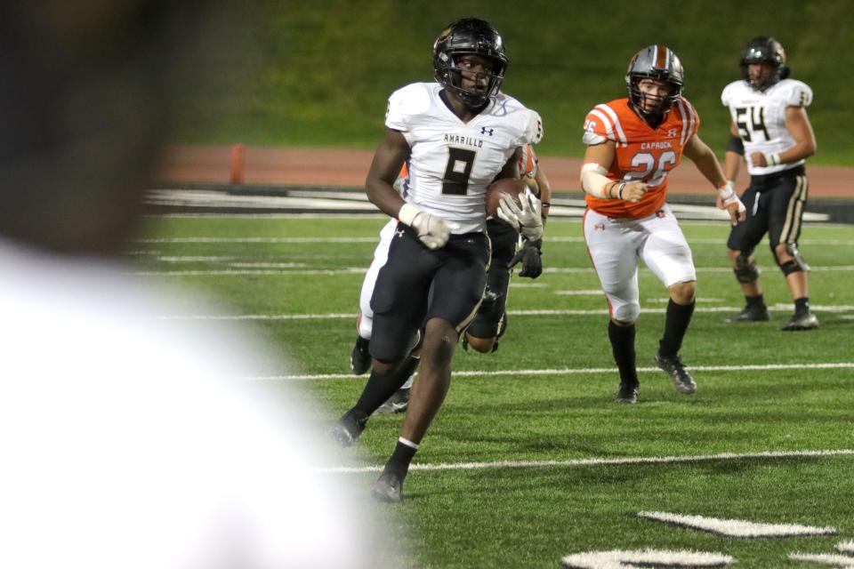 Amarillo High's Eddy Mpela (9) runs the ball against the Caprock defense during a District 2-5A Division I game Thursday, Sept. 29, 2022 at Dick Bivins Stadium in Amarillo.
