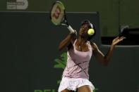 Mar 27, 2017; Miami, FL, USA; Venus Williams of the United States hits a forehand against Svetlana Kuznetsova of Russia (not pictured) on day seven of the 2017 Miami Open at Crandon Park Tennis Center. Williams won 6-3, 7-6(4). Mandatory Credit: Geoff Burke-USA TODAY Sports