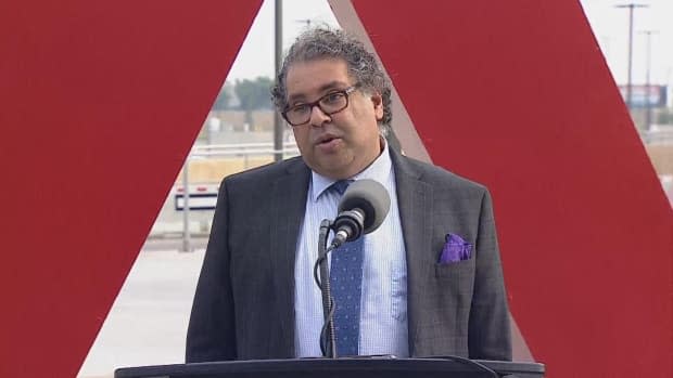 Calgary Mayor Naheed Nenshi says the goal of turning Airport Trail into a connector between Deerfoot Trail and Stoney Trail in nearly complete.  (CBC - image credit)