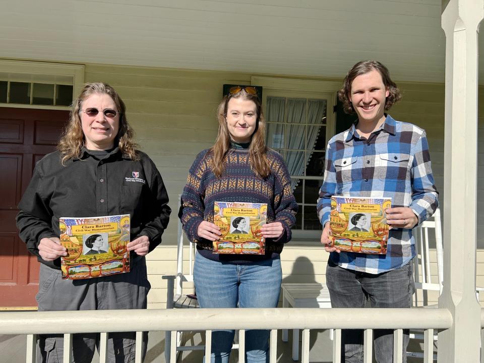 From left: Tracey McIntire, Olivia Peterson and John Lustrea speak at the Newcomer House in Keedysville about their contributions to a new book on Clara Barton.