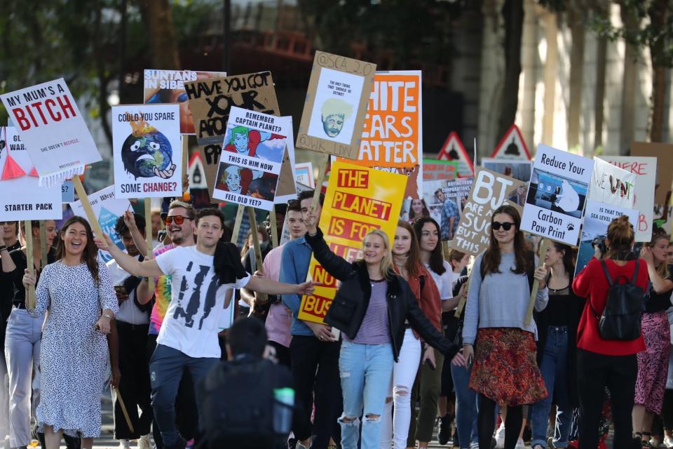 Protesters begin to gather ahead of the UK Student Climate Network's Global Climate Strike at Millbank in London. (PA)