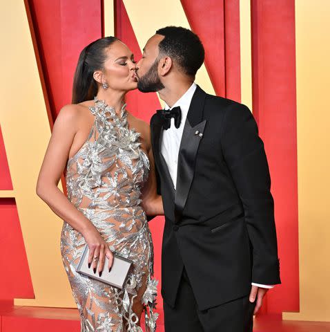 <p>Axelle/Bauer-Griffin/FilmMagic</p> Chrissy Teigen and John Legend attend the 2024 Vanity Fair Oscar Party