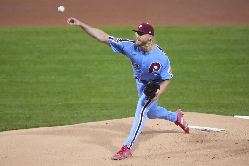 Philadelphia Phillies starting pitcher Noah Syndergaard throws during the first inning in Game 5 of baseball's World Series between the Houston Astros and the Philadelphia Phillies on Thursday, Nov. 3, 2022, in Philadelphia. (AP Photo/Chris Szagola)